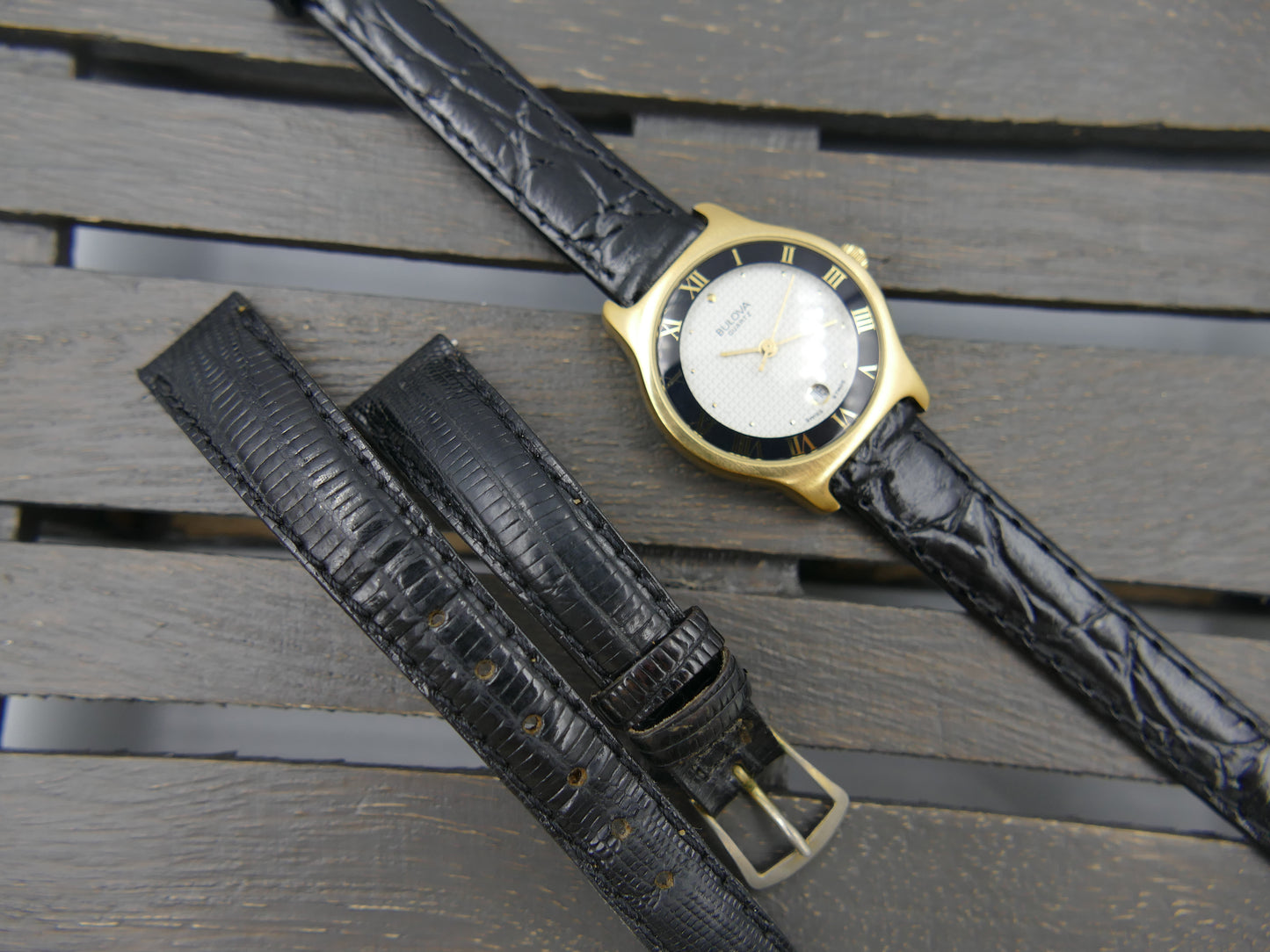 Bulova 97MO5 Roman Numeral Black Bezel Gold Tone SS Ladies Watch