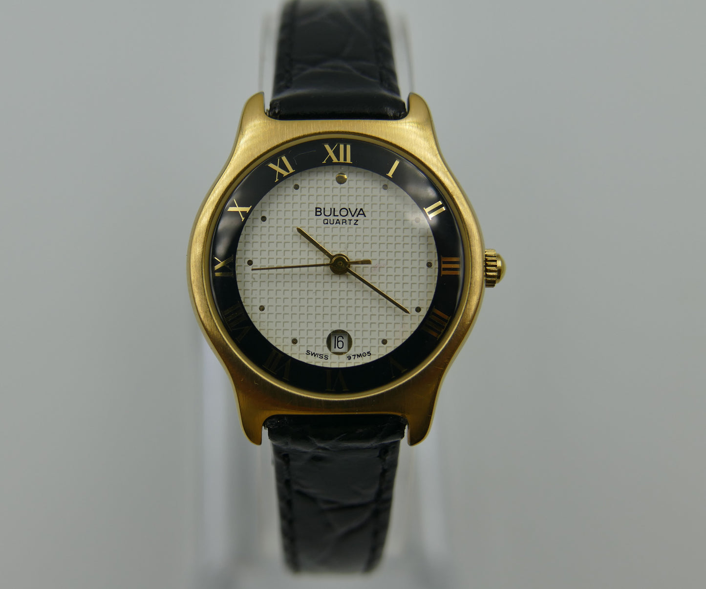 Bulova 97MO5 Roman Numeral Black Bezel Gold Tone SS Ladies Watch