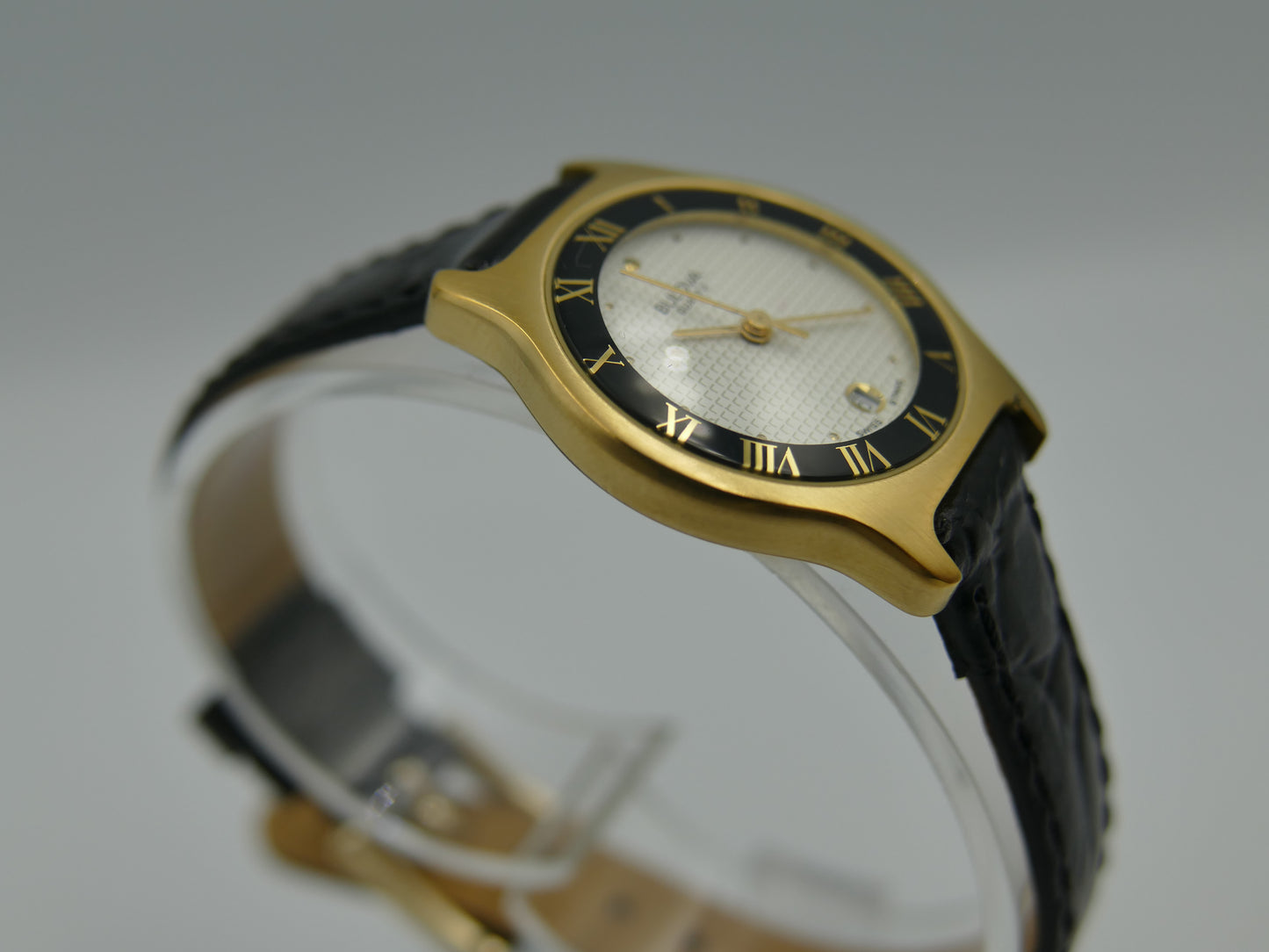 Bulova 97MO5 Roman Numeral Black Bezel Gold Tone SS Ladies Watch