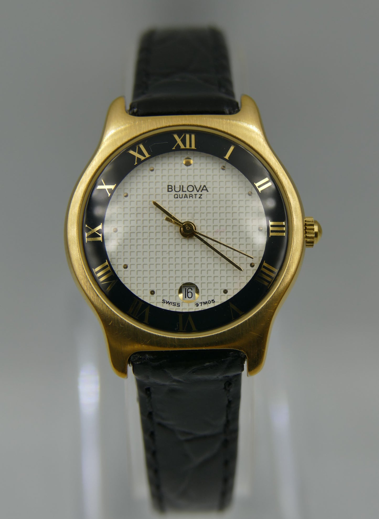 Bulova 97MO5 Roman Numeral Black Bezel Gold Tone SS Ladies Watch