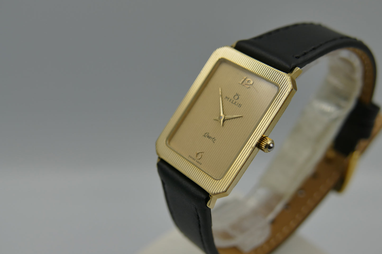 Vintage watch mens dress tank Milus ref 830.004 Gold Tone ultra Thin