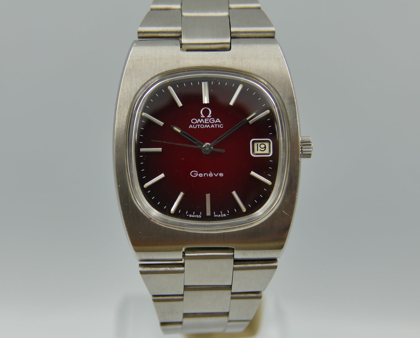 70s vintage watch Omega Geneve Automatic cal 1012 ref 166.0191 burgundy red dial NOS