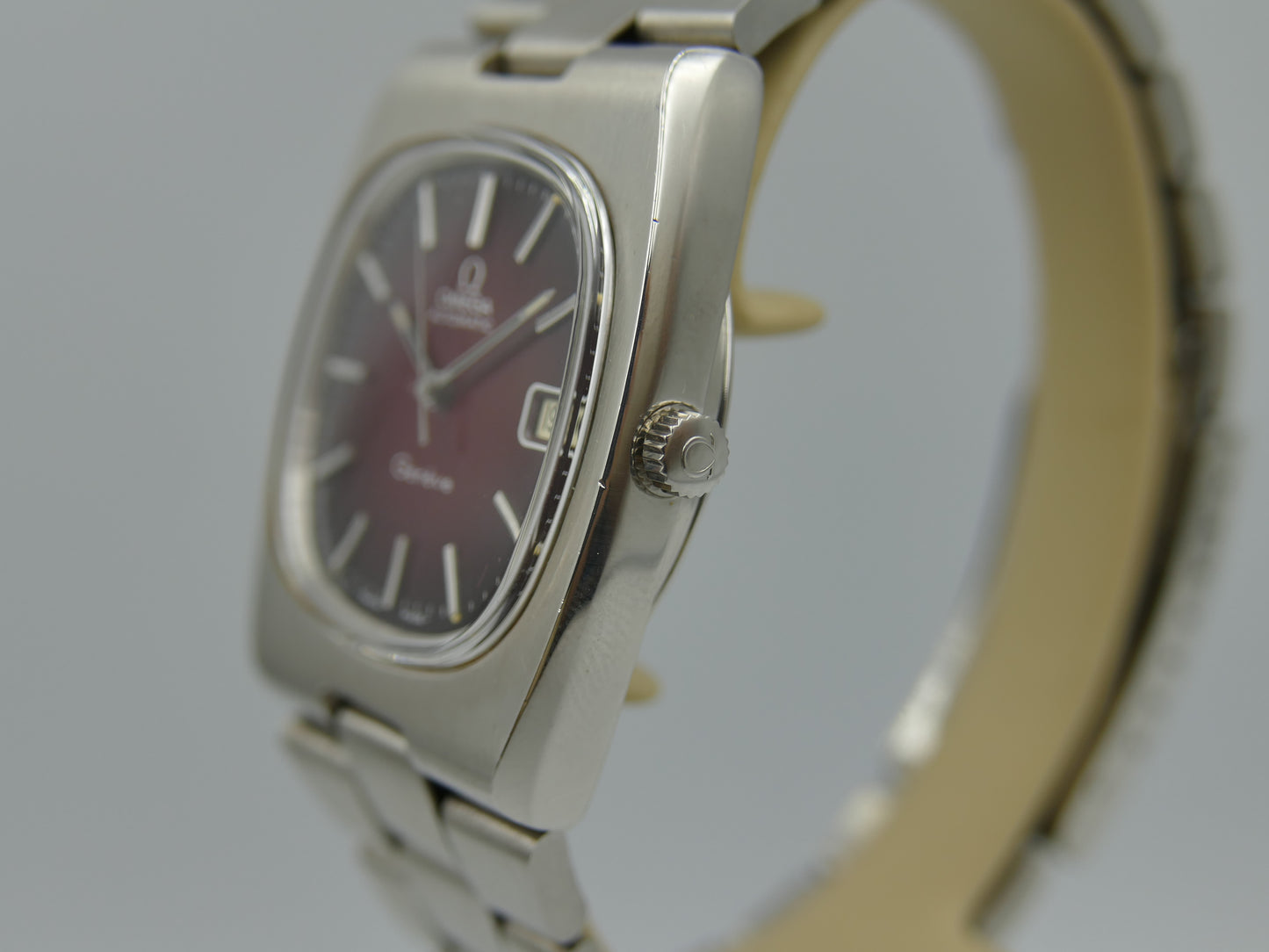 70s vintage watch Omega Geneve Automatic cal 1012 ref 166.0191 burgundy red dial NOS