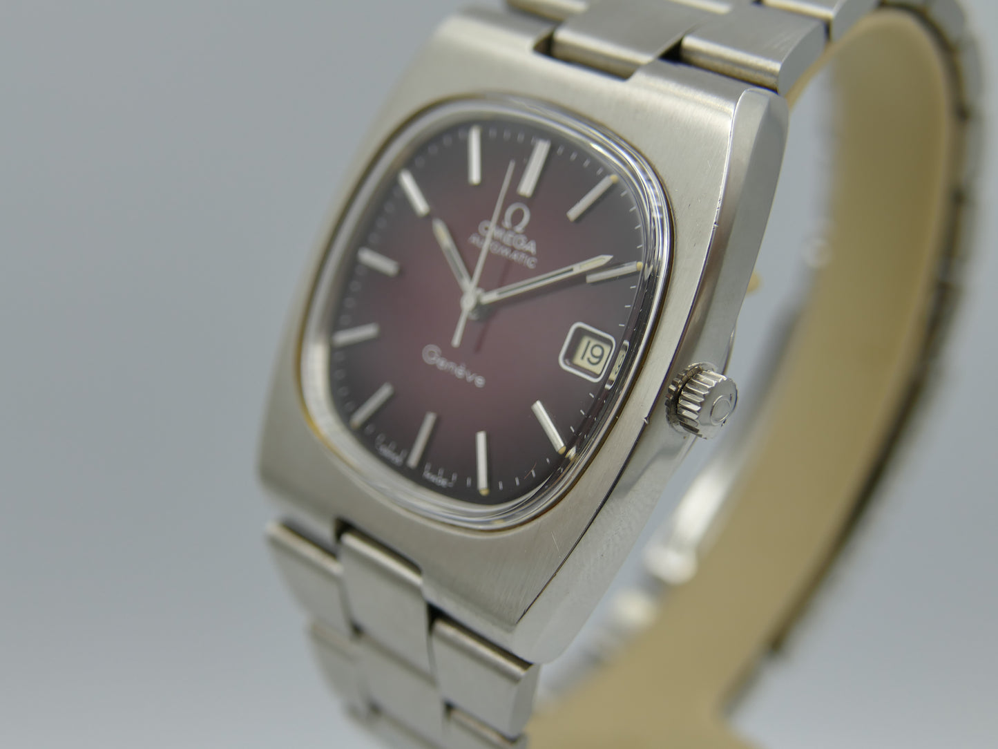 70s vintage watch Omega Geneve Automatic cal 1012 ref 166.0191 burgundy red dial NOS