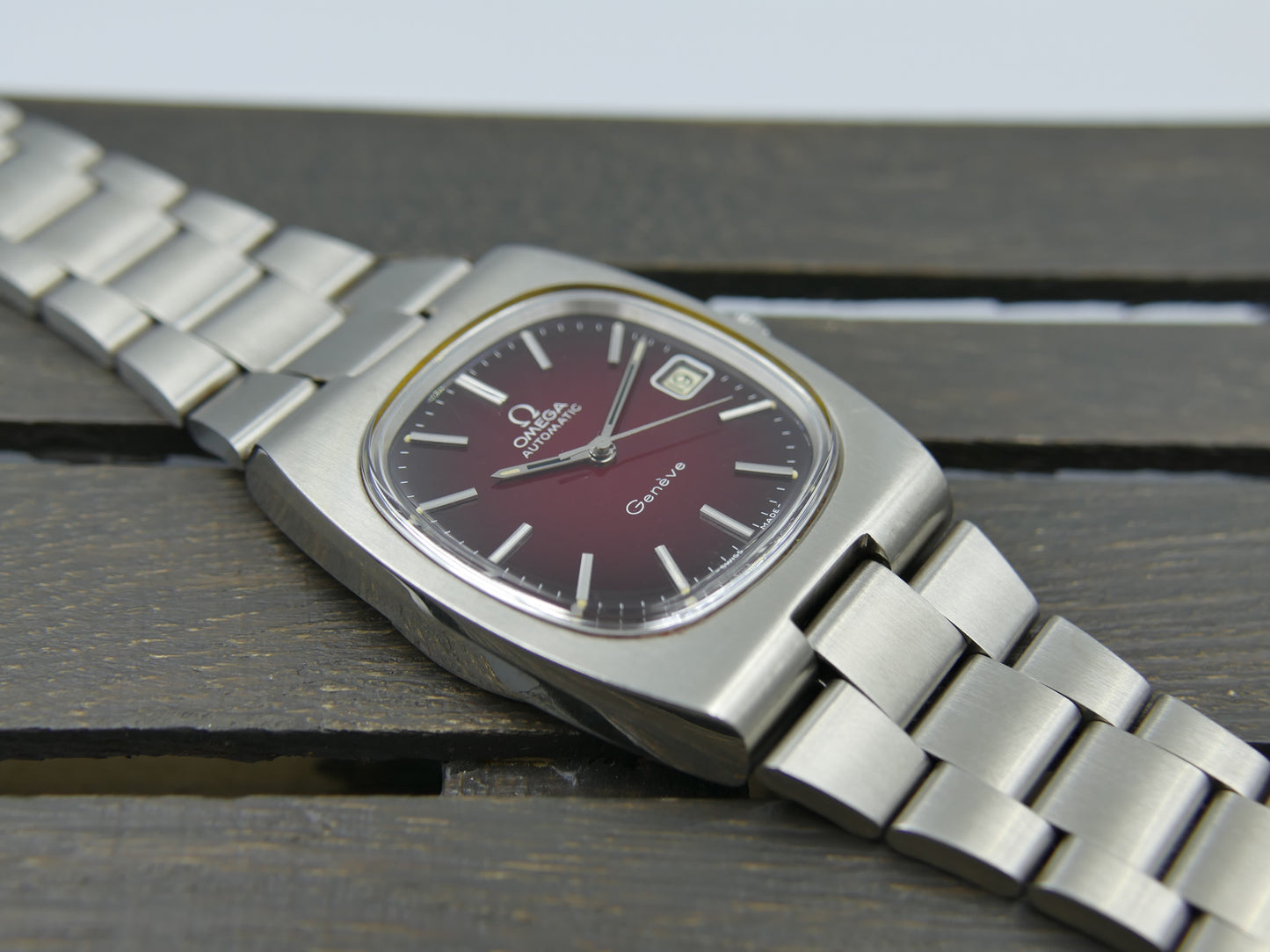 70s vintage watch Omega Geneve Automatic cal 1012 ref 166.0191 burgundy red dial NOS