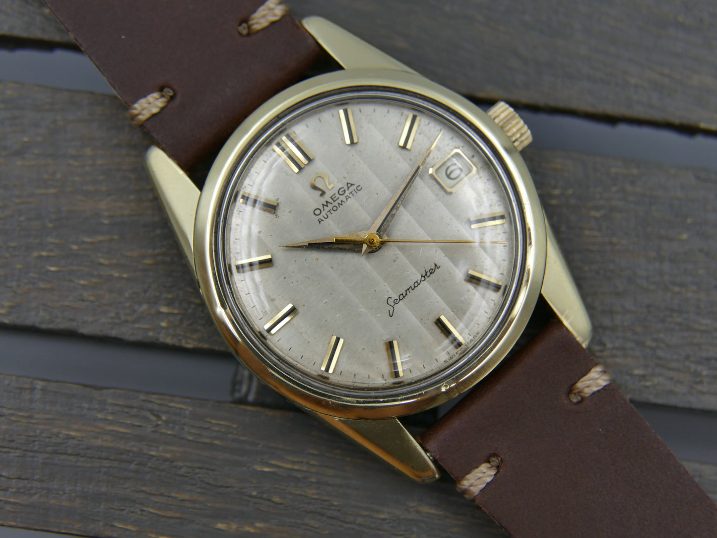 60s vintage watch mens Omega Seamaster ref 14701 61 SC automatic 562 gold cap Ribbon Wave