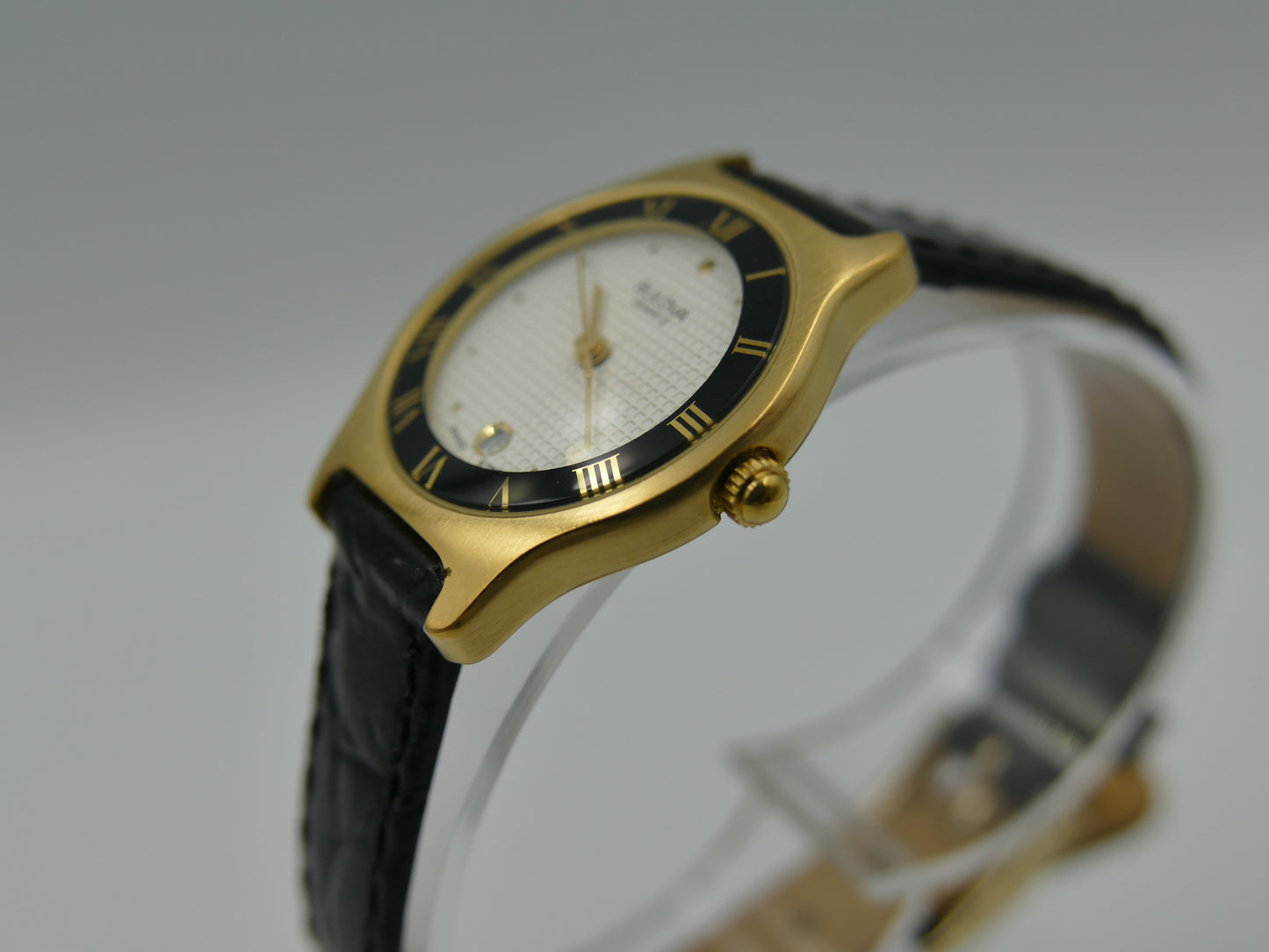 Bulova 97MO5 Roman Numeral Black Bezel Gold Tone SS Ladies Watch