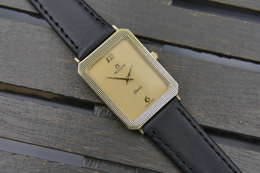 Vintage watch mens dress tank Milus ref 830.004 Gold Tone ultra Thin