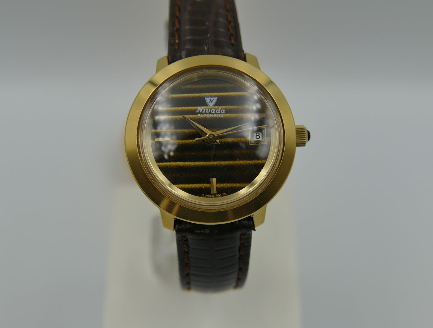 Vintage watch Nivada tiger eye dial Yves Saint Laurent ref 5490 automatic AS 1788