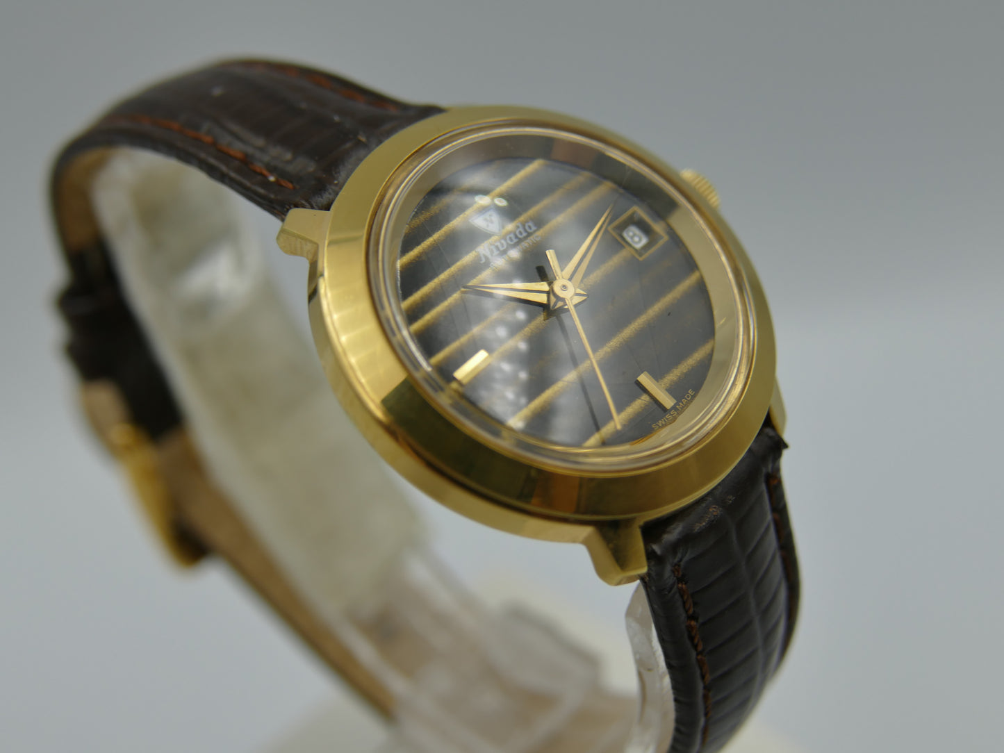 Vintage watch Nivada tiger eye dial Yves Saint Laurent ref 5490 automatic AS 1788