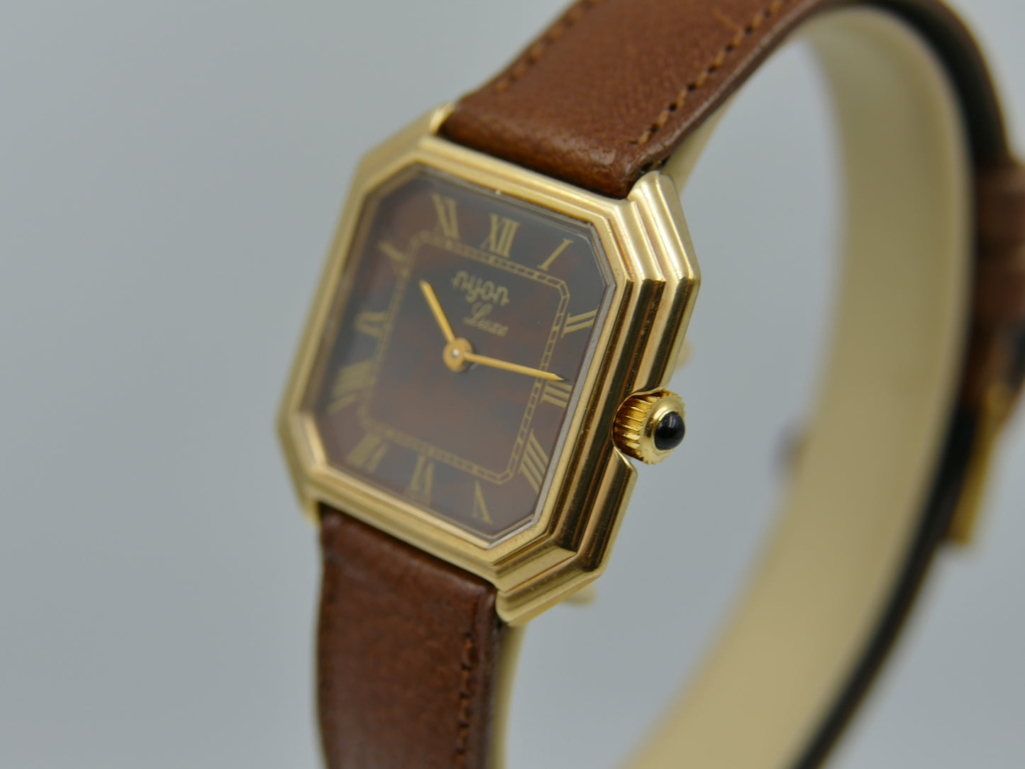 70s Vintage watch swiss Nyon Luxe (Ceinture) hand wind ST 69N marble brown NOS