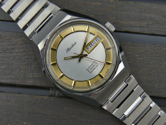 70s Vintage watch mens NOS Starlux ref 6004 automatic eta 2879 SS serviced