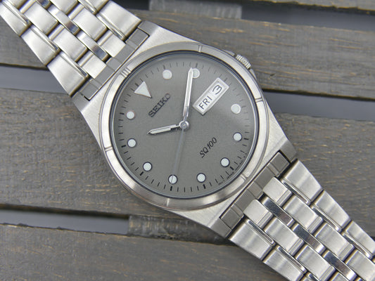 90s vintage watch mens japan SEIKO SQ 100 7N43-8200 NOS