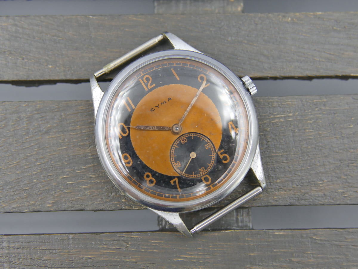40s vintage watch mens Cyma bullseye salmon hand wind 032 patented serviced