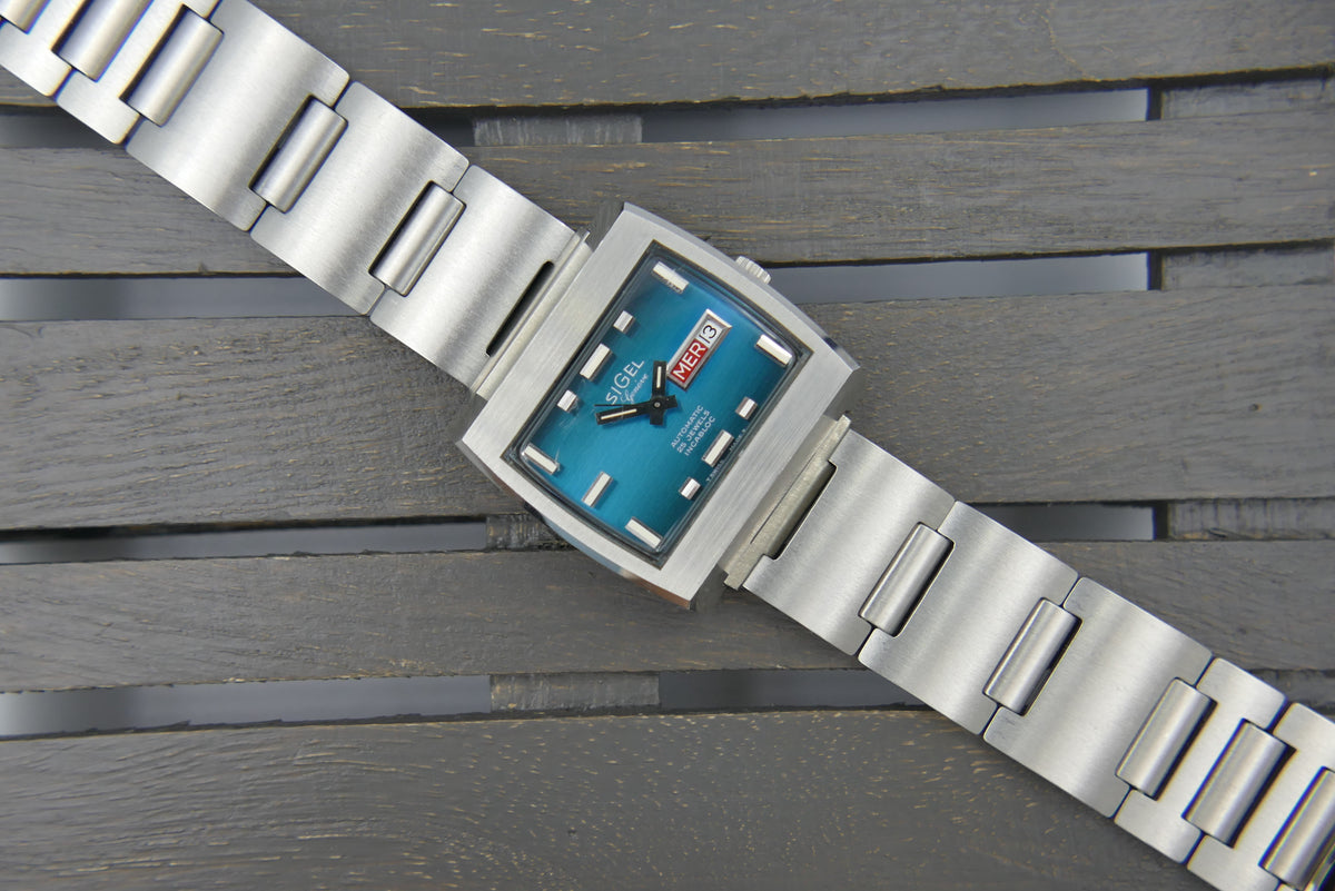 70s vintage watch mens Sigel TV geneve automatic 25 jewels blue dial swiss compressor