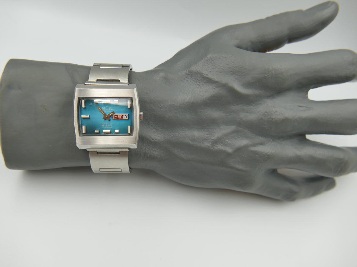 70s vintage watch mens Sigel TV geneve automatic 25 jewels blue dial swiss compressor