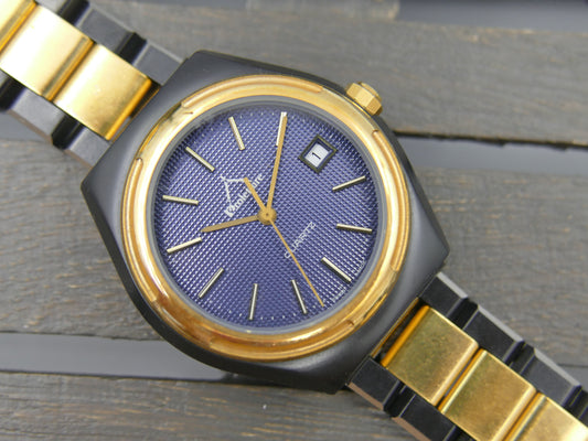 Orologio vintage anni '80 da uomo NOS Proletaire Swiss Made con quadrante waffle blu, PVD nero e oro