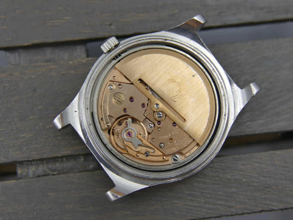 70s vintage watch mens Omega geneve ref 166.0169 automatic cal. 1022 green steel 36mm